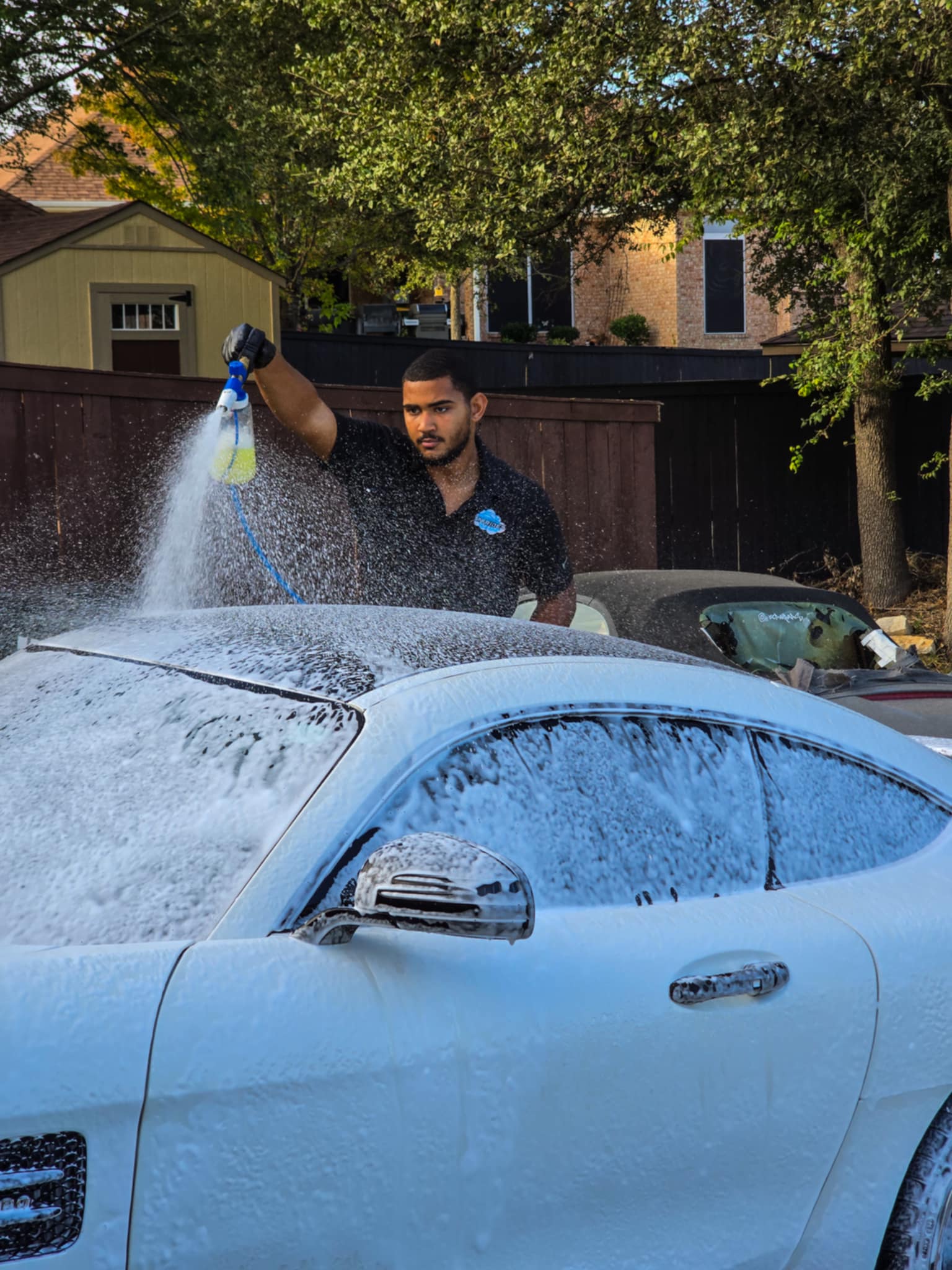 BMW, Ford, and Tesla Cyber truck undergoing expert ceramic coating at SkyRides Auto Care in Killeen, TX