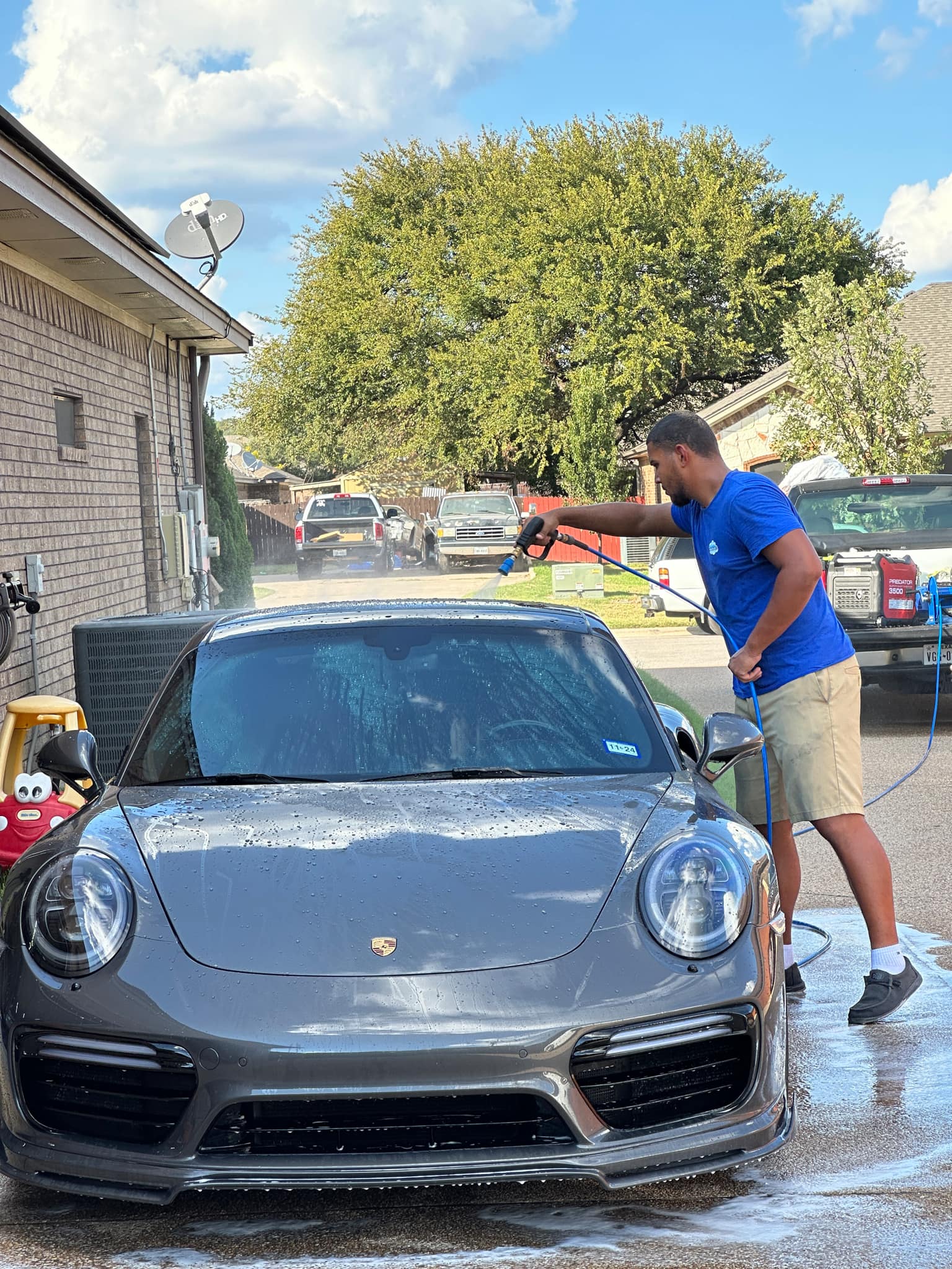 Porsche with a glossy finish after ceramic coating by SkyRides Auto Care.