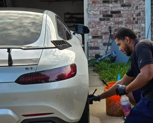 Expert Rivian Ceramic Coating Application by SkyRides Auto Care. Technician at SkyRides Auto Care applying ceramic coating to a Rivian in Killeen, TX.